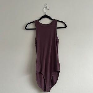 A new day small purple bodysuit